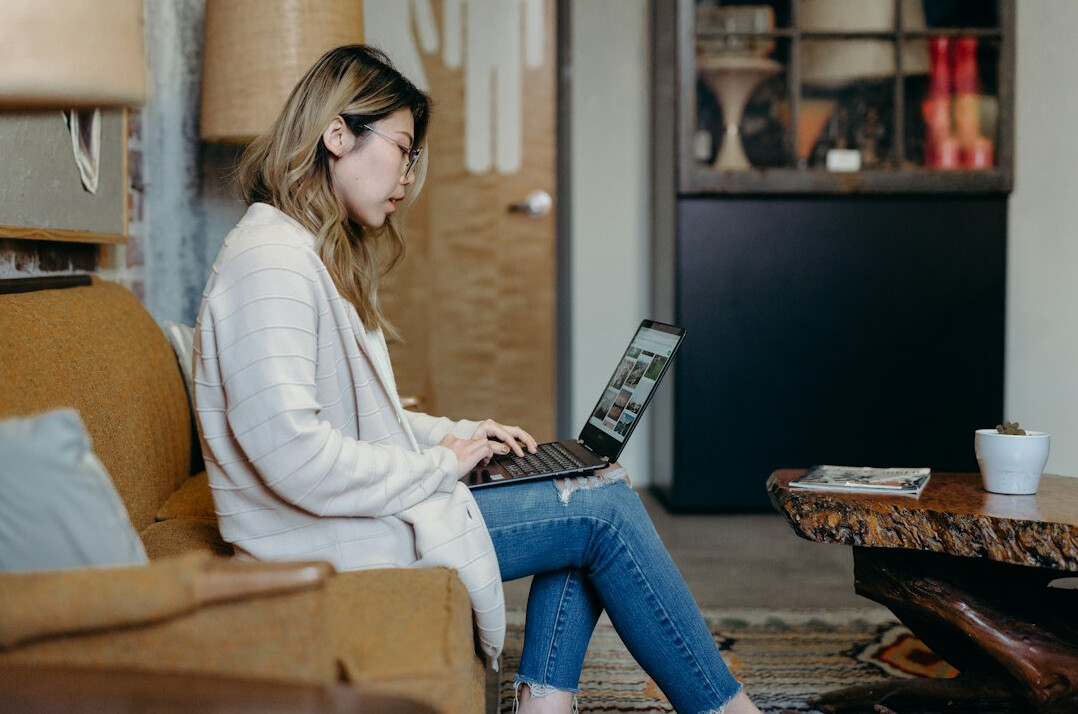 woman coding at home