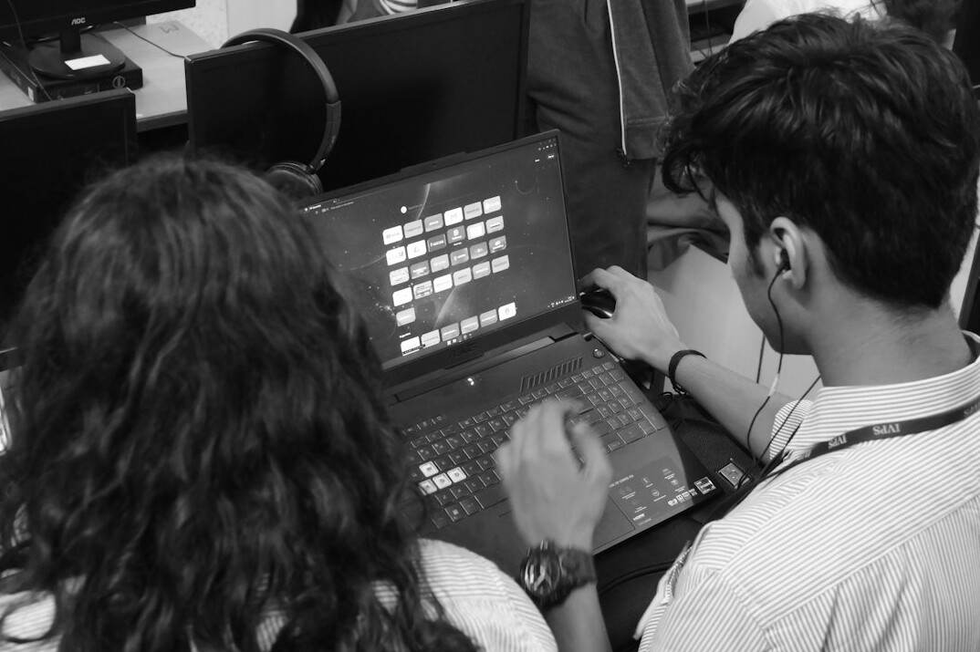 instructor teaching coding skills